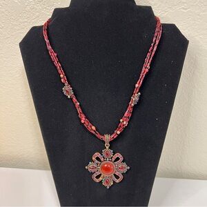 Elegant Red Beaded Necklace with Floral Pendant